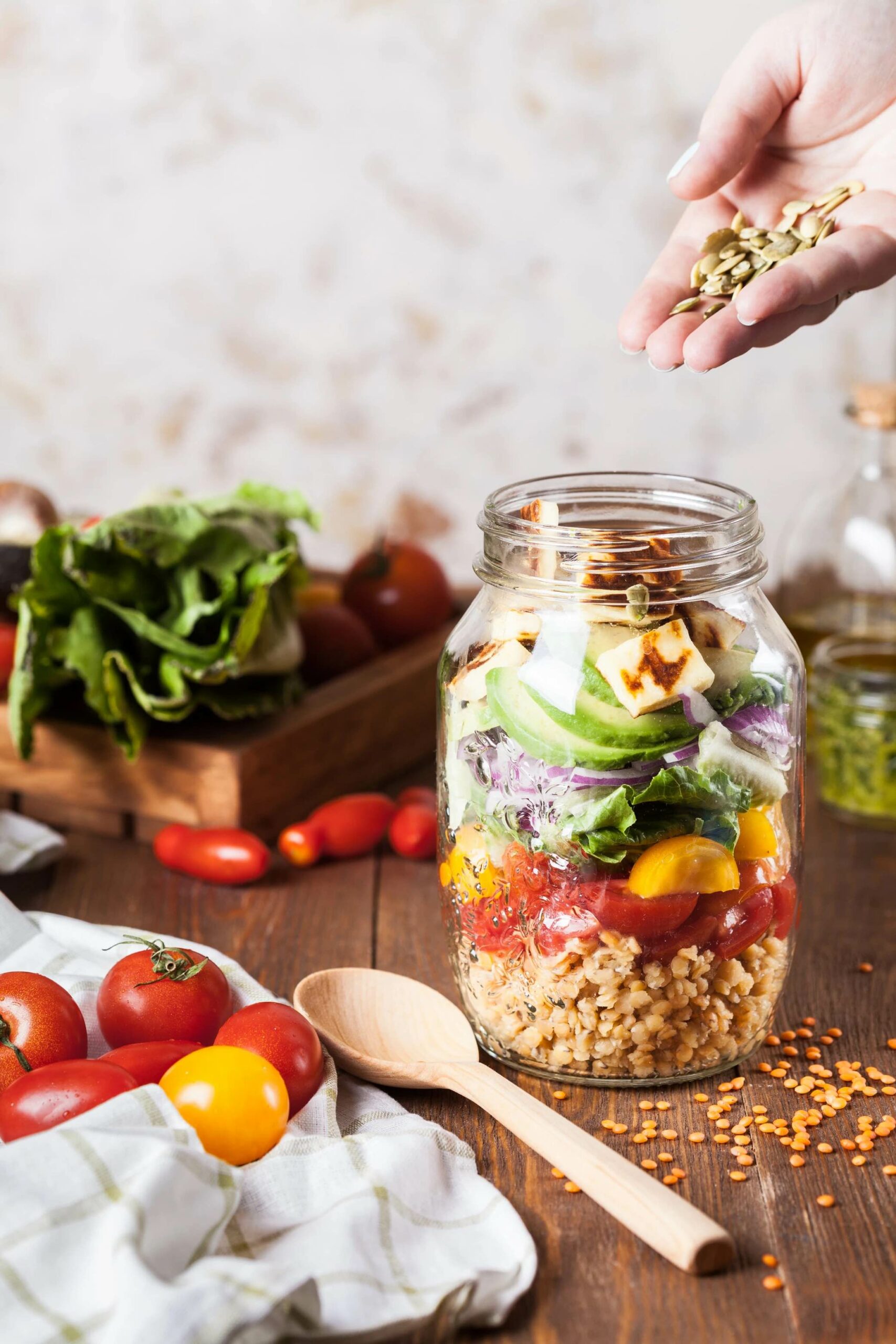 Fruits and vegetables on table and in Mason jar